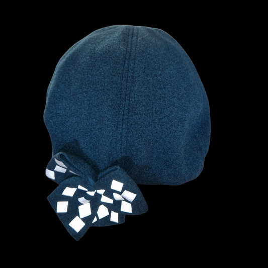 Alba - mössa med tillhörande reflexbrosch