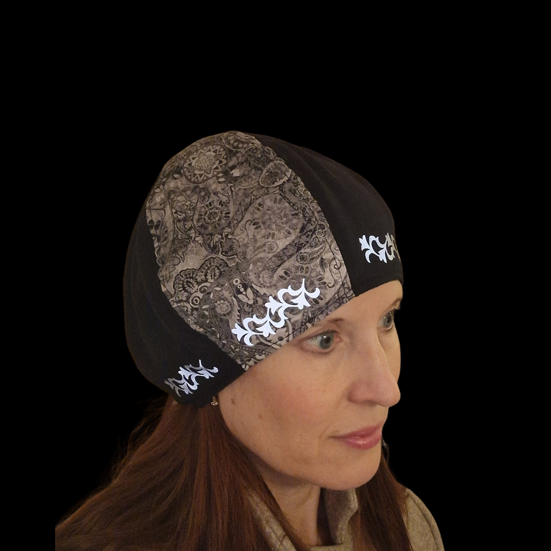 Frida - mössa med reflexmotiv