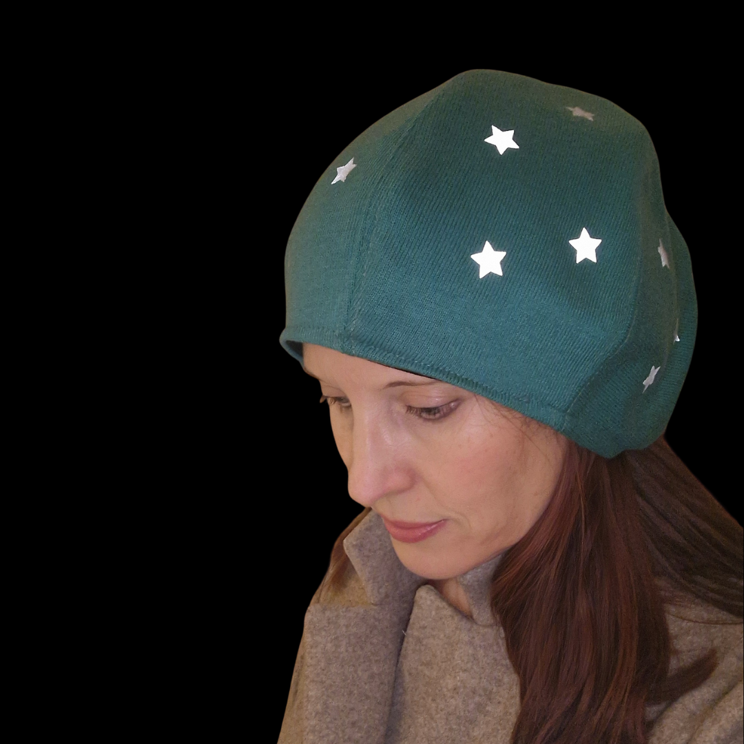 Stella - mössa med reflexmotiv