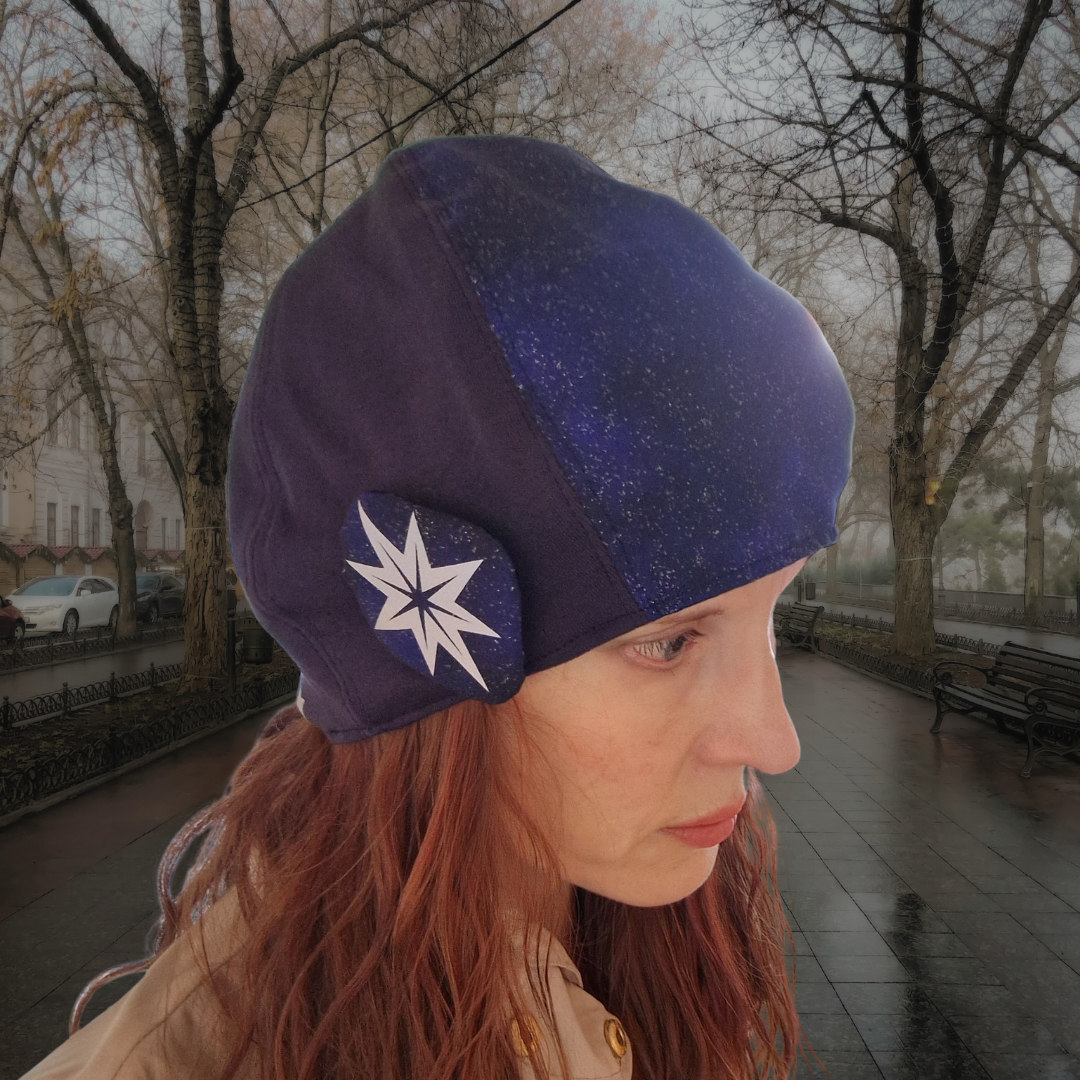 Orion - mössa med reflexbrosch