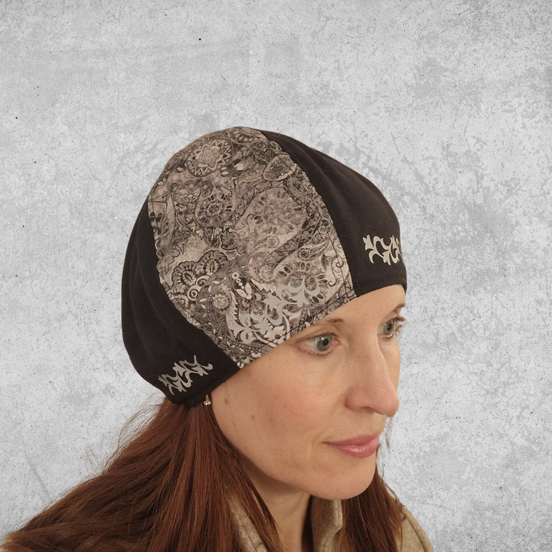 Frida - mössa med reflexmotiv